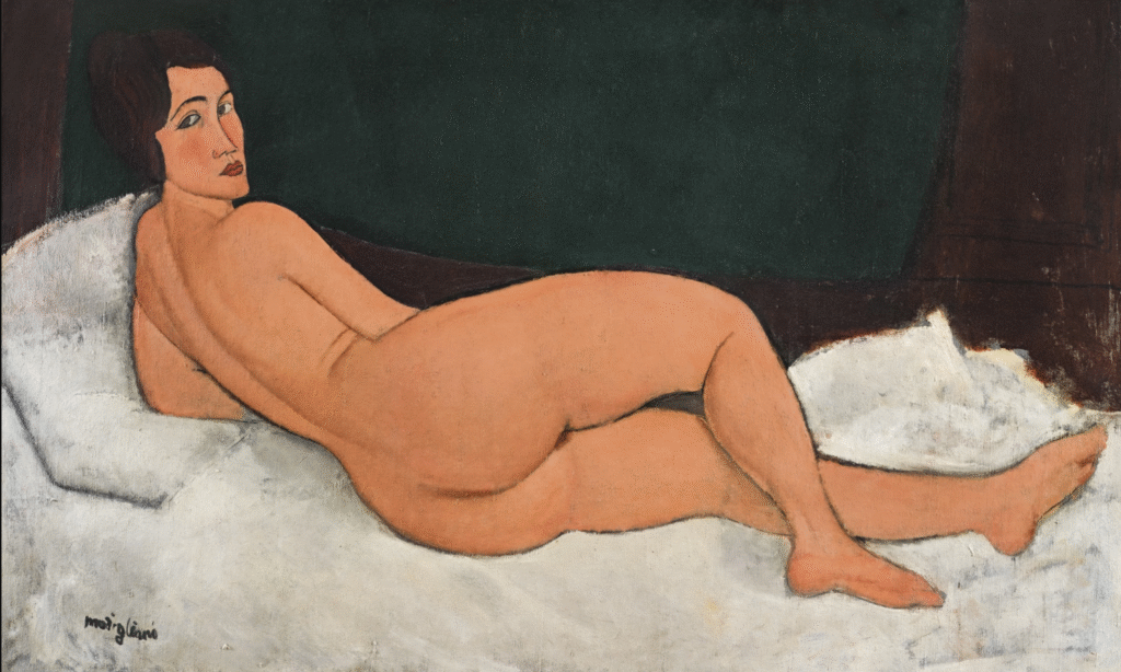 Painting by Modigliani of a nude woman laying on a bed